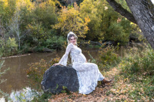 Littleton maternity and baby photographer family bump pregnant pregnancy Lair O' the Bear Park Colorado photography fall color leaves cowboy hats