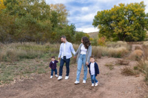 Littleton family photographer boys siblings brothers mother father fall Colorado Hildebrand Ranch photography foothills field Ken Caryl