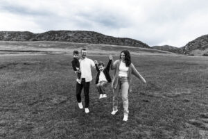 Littleton family photographer boys siblings brothers mother father fall Colorado Hildebrand Ranch photography foothills field Ken Caryl