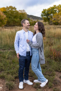 Littleton family photographer boys siblings brothers mother father fall Colorado Hildebrand Ranch photography foothills field Ken Caryl
