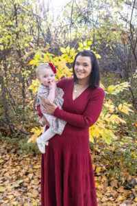 Littleton family photographer Fly'N B park Highlands Ranch Colorado one year old baby mother father child daughter little girl photography fall cake smash