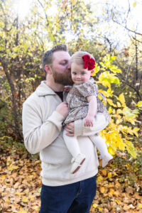 Littleton family photographer Fly'N B park Highlands Ranch Colorado one year old baby mother father child daughter little girl photography fall cake smash