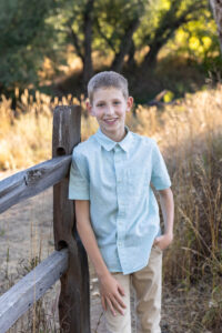 Littleton family photographer Stone House in Lakewood Colorado kids mother father photography brother sister fall sunset golden hour leaves