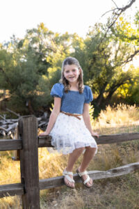 Littleton family photographer Stone House in Lakewood Colorado kids mother father photography brother sister fall sunset golden hour leaves