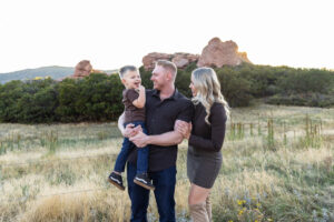 Littleton family photographer mother father son child little boy Colorado South Valley Park red rocks photography sunset