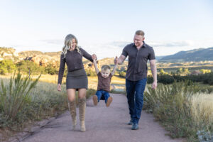 Littleton family photographer mother father son child little boy Colorado South Valley Park red rocks photography sunset