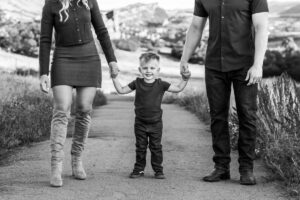 Littleton family photographer mother father son child little boy Colorado South Valley Park red rocks photography sunset