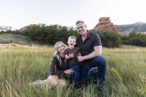 Littleton family photographer mother father son child little boy Colorado South Valley Park red rocks photography sunset