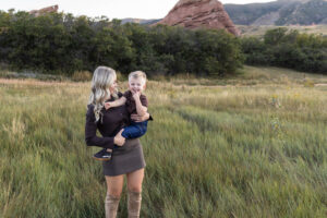 Littleton family photographer mother father son child little boy Colorado South Valley Park red rocks photography sunset