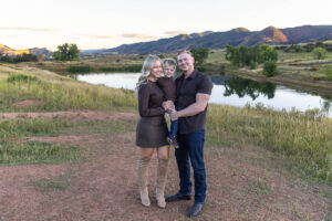 Littleton family photographer mother father son child little boy Colorado South Valley Park red rocks photography sunset