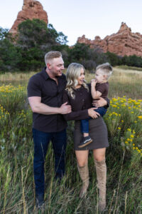 Littleton family photographer mother father son child little boy Colorado South Valley Park red rocks photography sunset