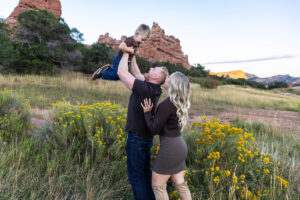Littleton family photographer mother father son child little boy Colorado South Valley Park red rocks photography sunset