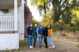 Littleton family photographer Fly'N B park Highlands Ranch Colorado photography fall color teens teenagers adult children siblings mother father sisters brother water pond marriage married