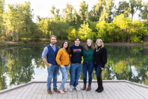 Littleton family photographer Fly'N B park Highlands Ranch Colorado photography fall color teens teenagers adult children siblings mother father sisters brother water pond marriage married