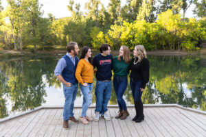 Littleton family photographer Fly'N B park Highlands Ranch Colorado photography fall color teens teenagers adult children siblings mother father sisters brother water pond marriage married