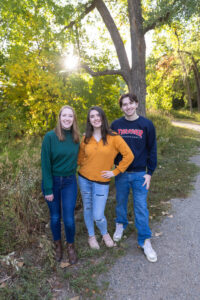 Littleton family photographer Fly'N B park Highlands Ranch Colorado photography fall color teens teenagers adult children siblings mother father sisters brother water pond marriage married