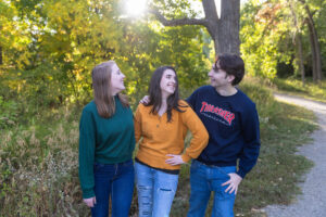 Littleton family photographer Fly'N B park Highlands Ranch Colorado photography fall color teens teenagers adult children siblings mother father sisters brother water pond marriage married