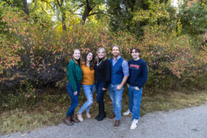 Littleton family photographer Fly'N B park Highlands Ranch Colorado photography fall color teens teenagers adult children siblings mother father sisters brother water pond marriage married