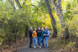 Littleton family photographer Fly'N B park Highlands Ranch Colorado photography fall color teens teenagers adult children siblings mother father sisters brother water pond marriage married