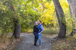 Littleton family photographer Fly'N B park Highlands Ranch Colorado photography fall color teens teenagers adult children siblings mother father sisters brother water pond marriage married
