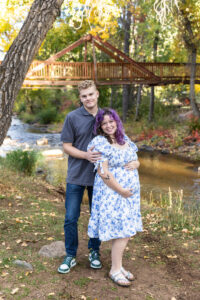 Littleton family photographer mini sessions Morrison Park fall photography Colorado dogs puppies couples mother father kids children siblings bridge river color brother sister baby