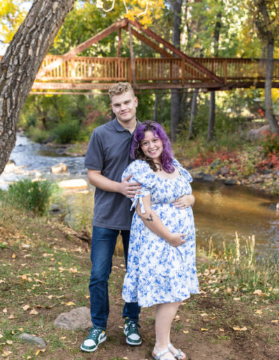 Littleton family photographer mini sessions Morrison Park fall photography Colorado dogs puppies couples mother father kids children siblings bridge river color brother sister baby