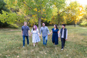 Littleton family photographer mini sessions Morrison Park fall photography Colorado dogs puppies couples mother father kids children siblings bridge river color brother sister baby