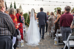 Littleton wedding photographer Colorado Ashley Ridge Wedgewood ceremony photography fall bride groom party reception cake bridal bridesmaids groomsmen bouquet rain outdoor father daughter aisle