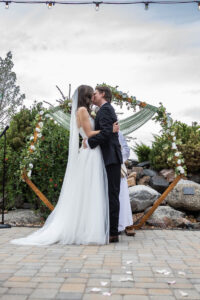 Littleton wedding photographer Colorado Ashley Ridge Wedgewood ceremony photography fall bride groom party reception cake bridal bridesmaids groomsmen bouquet rain outdoor first kiss