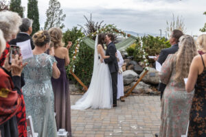 Littleton wedding photographer Colorado Ashley Ridge Wedgewood ceremony photography fall bride groom party reception cake bridal bridesmaids groomsmen bouquet rain outdoor first kiss aisle husband wife