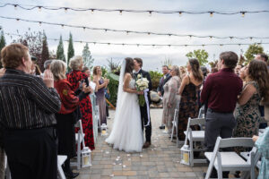 Littleton wedding photographer Colorado Ashley Ridge Wedgewood ceremony photography fall bride groom party reception cake bridal bridesmaids groomsmen bouquet rain outdoor