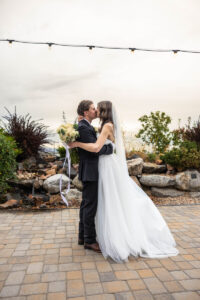 Littleton wedding photographer Colorado Ashley Ridge Wedgewood ceremony photography fall bride groom party reception cake bridal bridesmaids groomsmen bouquet rain outdoor kiss