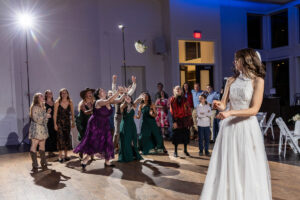 Littleton wedding photographer Colorado Ashley Ridge Wedgewood ceremony photography fall bride groom party reception cake bridal bridesmaids groomsmen bouquet rain outdoor toss