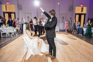 Littleton wedding photographer Colorado Ashley Ridge Wedgewood ceremony photography fall bride groom party reception cake bridal bridesmaids groomsmen bouquet rain outdoor garter toss