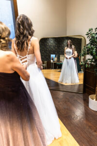 Littleton wedding photographer Colorado Ashley Ridge Wedgewood ceremony photography fall bride groom party reception cake bridal bridesmaids groomsmen bouquet rain outdoor mother daughter