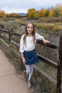 Littleton family photographer Carson Nature Center Colorado fall leaves South Platte river kids mother father children siblings brother sisters foothills bridge friends church