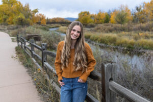 Littleton family photographer Carson Nature Center Colorado fall leaves South Platte river kids mother father children siblings brother sisters foothills bridge friends church