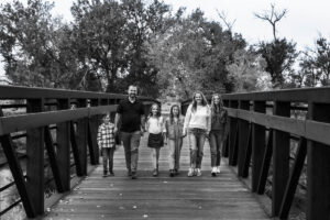Littleton family photographer Carson Nature Center Colorado fall leaves South Platte river kids mother father children siblings brother sisters foothills bridge friends church