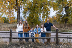 Littleton family photographer Carson Nature Center Colorado fall leaves South Platte river kids mother father children siblings brother sisters foothills bridge friends church