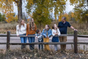 Littleton family photographer Carson Nature Center Colorado fall leaves South Platte river kids mother father children siblings brother sisters foothills bridge friends church