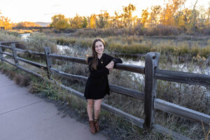 Littleton family photographer Carson Nature Center Colorado fall color bridge brother sister mother father siblings daughter son photography foothills dog fence log