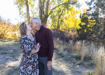Littleton family photographer couple married marriage in love Colorado fall photography husband wife