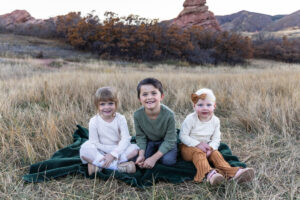 Littleton family photographer extended grandparents grandkids children kids mother father son daughter siblings Colorado South Valley Open Space photography foothills fall red rocks cousins