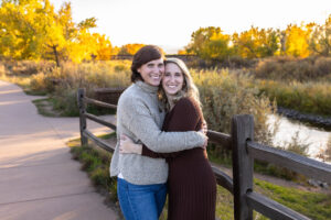 Littleton family photographer extended fall photo session Colorado grandmother granddaughter sisters husbands South Platte river area Carson Nature Center photography mother father child yellow leaves 