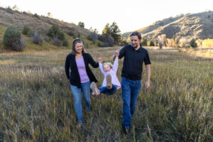 Littleton family photographer Lair O' the Bear park Morrison Colorado fall dog mother father daughter toddler photography foothills field