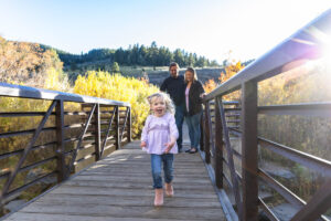 Littleton family photographer Lair O' the Bear park Morrison Colorado fall dog mother father daughter toddler photography foothills field bridge running