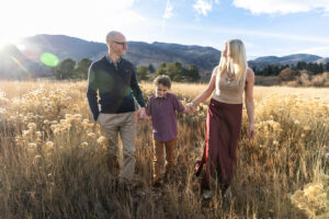 Littleton family photographer Colorado foothills mother father son kid child photography sunset Ken Caryl Valley grandmother aunts uncles red rocks