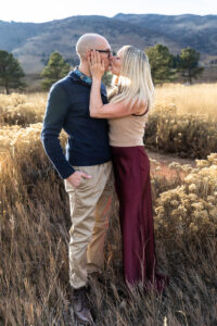 Littleton family photographer Colorado foothills mother father son kid child photography sunset Ken Caryl Valley grandmother aunts uncles red rocks