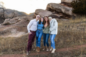 Littleton family photographer Colorado foothills mother father son kid child photography sunset Ken Caryl Valley grandmother aunts uncles red rocks