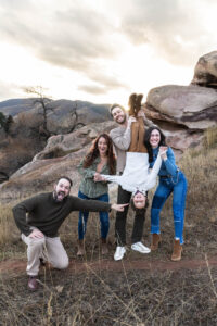 Littleton family photographer Colorado foothills mother father son kid child photography sunset Ken Caryl Valley grandmother aunts uncles red rocks